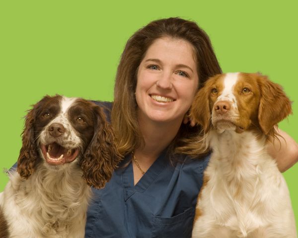 Carrie Adrian PT with her two dogs
